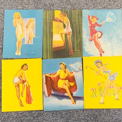 LOT 79: Collection of Vintage Pin-up Girl Posters, Julie London Calendar Girl 1956 Vinyl LP, and a Set of Venus De Milo Salt and Pepper...