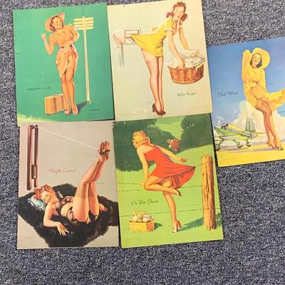 LOT 79: Collection of Vintage Pin-up Girl Posters, Julie London Calendar Girl 1956 Vinyl LP, and a Set of Venus De Milo Salt and Pepper...