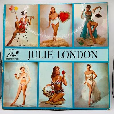 LOT 79: Collection of Vintage Pin-up Girl Posters, Julie London Calendar Girl 1956 Vinyl LP, and a Set of Venus De Milo Salt and Pepper...