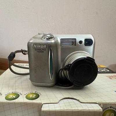 NIKON COOLPIX 4300 CAMERA, CLOCKS AND MEMOREX RADIO