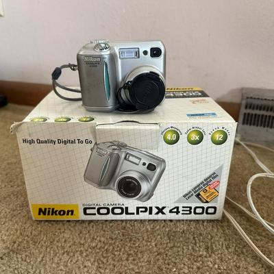 NIKON COOLPIX 4300 CAMERA, CLOCKS AND MEMOREX RADIO