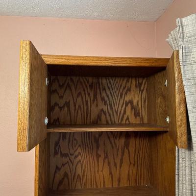TALL WOODEN CABINET