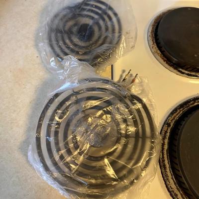 WHIRLPOOL SELF CLEANING OVEN WITH 4 BURNERS AND 4 EXTRA BURNERS