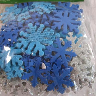 New in pkgs. 2 boxes craft berry stems, 1 pkg of 108 foam snowflakes