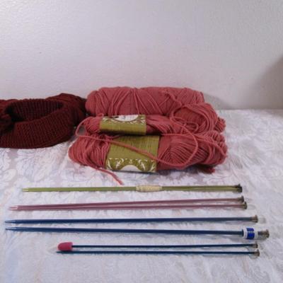 4 sets of knitting needles, yarn