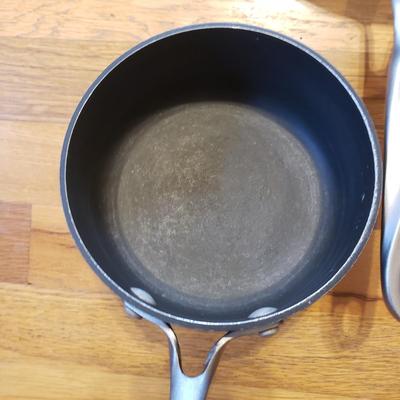 Eight Piece Calphalon, All-Clad and NSF Pots and Pans (K-KD)