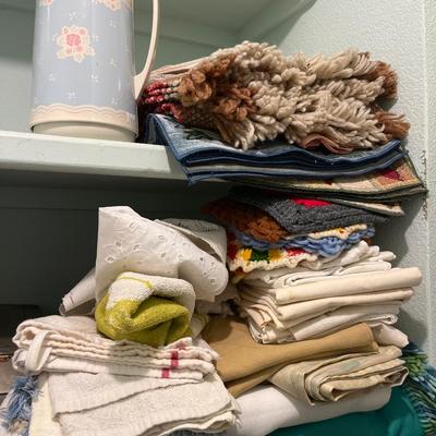 Tupperware, small appliances, kitchen towels and table cloths, cleaning supplies
