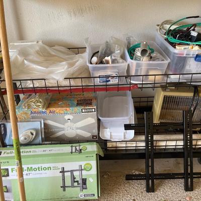 Metal shelves with misc. items on it