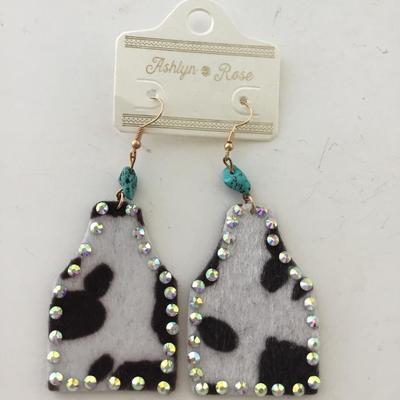 Ashlyn and rose cow print dangle earrings