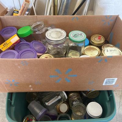 Both Coleman irons, jelly jars, light bulbs, and misc. items