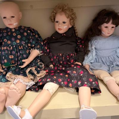 Three Porcelain Dolls