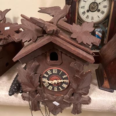 3 vintage clocks and 1 vintage cuckoo clock