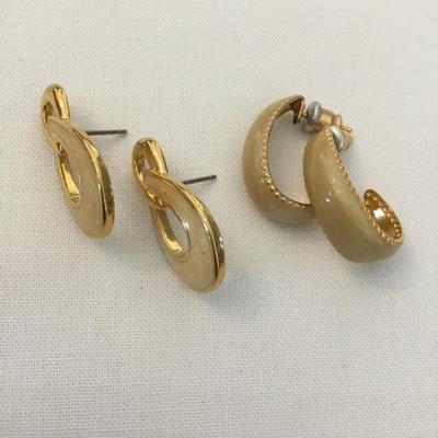 Two pairs of gold, toned cream colored enameled earrings