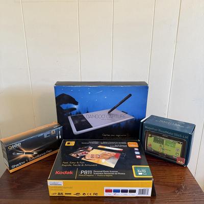 LOT 23X: Bamboo Capture Pen & Touch, Kodak Personal Photo Scanner NIB, Shadow 1 Surveillance Pen & Magellan RoadMate 5045-LM