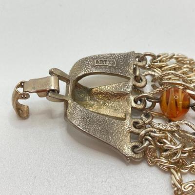 LOT 20: Multi Strand Necklace and Bracelet with Gold Tone Pendant Necklace