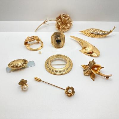 LOT 24: Large Collection of Gold Tone Jewelry - Pins, Brooches and Ring