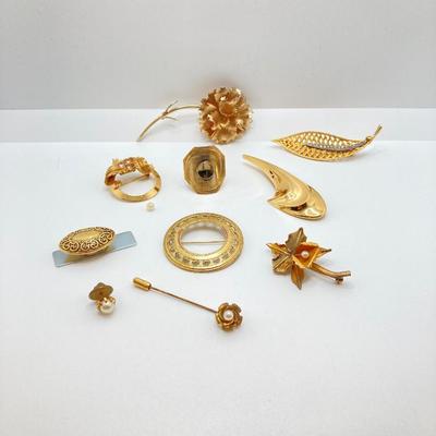 LOT 24: Large Collection of Gold Tone Jewelry - Pins, Brooches and Ring