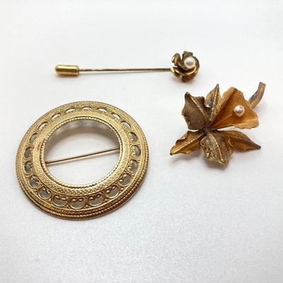 LOT 24: Large Collection of Gold Tone Jewelry - Pins, Brooches and Ring