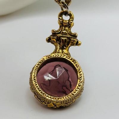 LOT 82: Faux Amethyst Tri- Strand Necklace w/Cameo Pendant & Pierced Earrings
