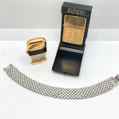 LOT 85: Vintage Lighters and Jewelry - Engraved Brass Zippo, Scripto and Stainless Steel Bracelet