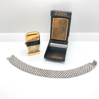 LOT 85: Vintage Lighters and Jewelry - Engraved Brass Zippo, Scripto and Stainless Steel Bracelet