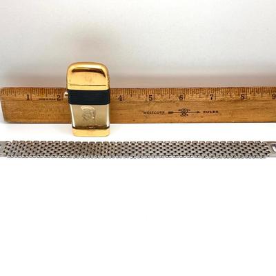 LOT 85: Vintage Lighters and Jewelry - Engraved Brass Zippo, Scripto and Stainless Steel Bracelet