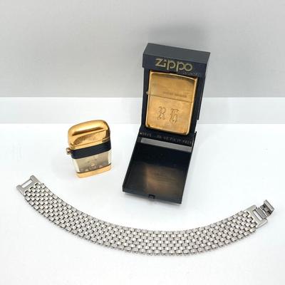 LOT 85: Vintage Lighters and Jewelry - Engraved Brass Zippo, Scripto and Stainless Steel Bracelet