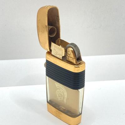 LOT 85: Vintage Lighters and Jewelry - Engraved Brass Zippo, Scripto and Stainless Steel Bracelet