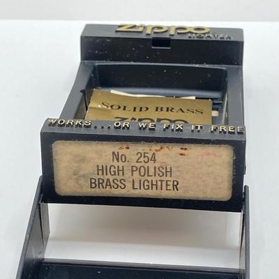 LOT 85: Vintage Lighters and Jewelry - Engraved Brass Zippo, Scripto and Stainless Steel Bracelet
