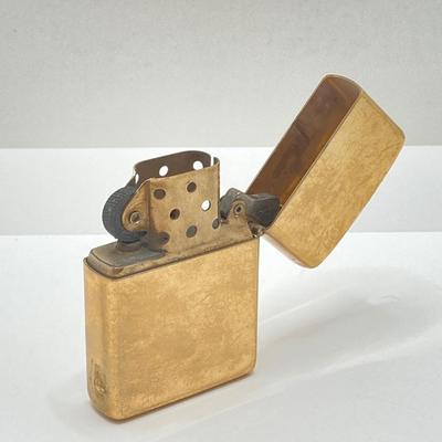 LOT 85: Vintage Lighters and Jewelry - Engraved Brass Zippo, Scripto and Stainless Steel Bracelet