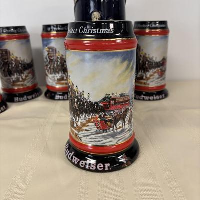 LOT 114: Vintage Western Germany Stein (1.5 liters) & 1992 Budweiser Christmas Steins (5)
