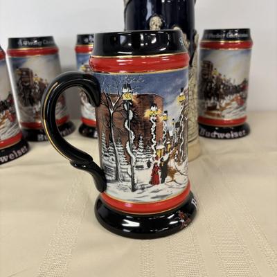 LOT 114: Vintage Western Germany Stein (1.5 liters) & 1992 Budweiser Christmas Steins (5)