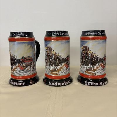 LOT 114: Vintage Western Germany Stein (1.5 liters) & 1992 Budweiser Christmas Steins (5)