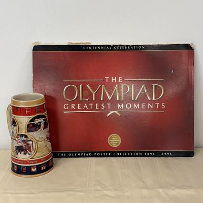 LOT 118: Set of Centennial Celebration The Olympiad Greatest Moments Poster Collection & Calgary 1988 Winter Olympic Winter Games Stein