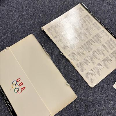 LOT 118: Set of Centennial Celebration The Olympiad Greatest Moments Poster Collection & Calgary 1988 Winter Olympic Winter Games Stein
