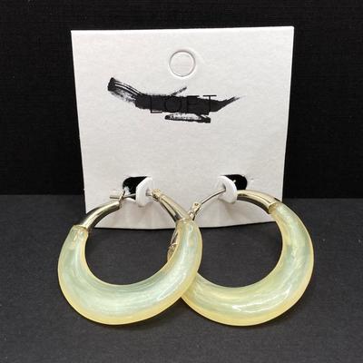 LOT 120: Gold Tone Hand Jewelry / Ring Holder with Collection of Earrings - Kenneth Cole, Baublebar and More