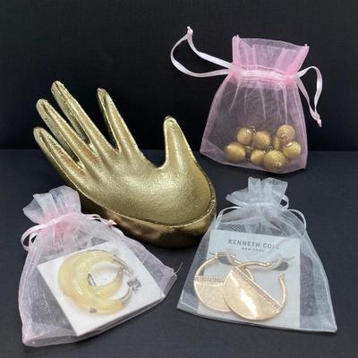 LOT 120: Gold Tone Hand Jewelry / Ring Holder with Collection of Earrings - Kenneth Cole, Baublebar and More