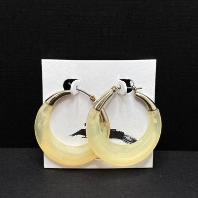 LOT 120: Gold Tone Hand Jewelry / Ring Holder with Collection of Earrings - Kenneth Cole, Baublebar and More
