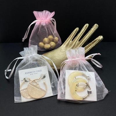 LOT 120: Gold Tone Hand Jewelry / Ring Holder with Collection of Earrings - Kenneth Cole, Baublebar and More