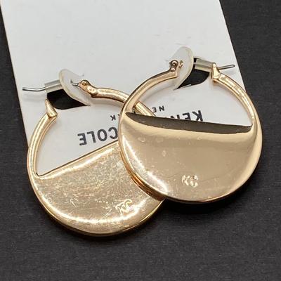 LOT 120: Gold Tone Hand Jewelry / Ring Holder with Collection of Earrings - Kenneth Cole, Baublebar and More