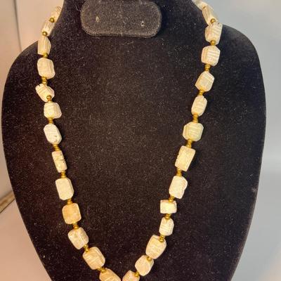 Hand carved soapstone (?) necklace