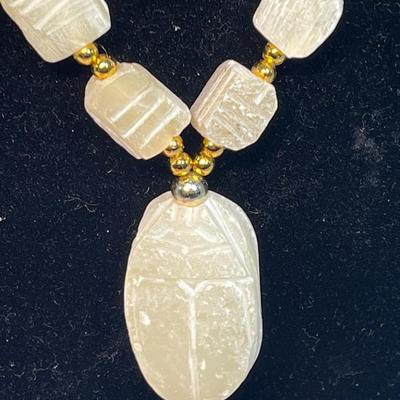 Hand carved soapstone (?) necklace