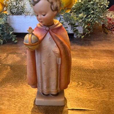 Sale Photo Thumbnail #519: reglious boy HOLDING round bowl with cross figurine