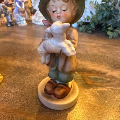 Sale Photo Thumbnail #524: HUMMEL BOY HOLDING GOAT