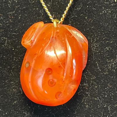 Asian carved necklace