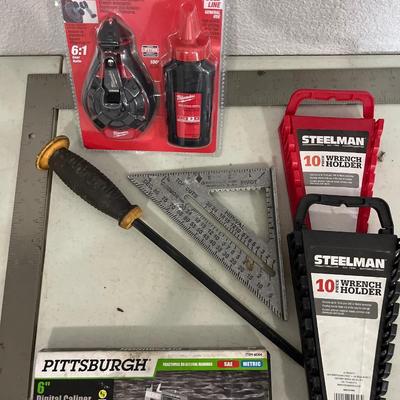 Square, triangle, chalk, reel, wrench holders, and caliper