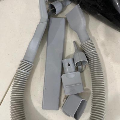Dustbuster, accessories and tool bag