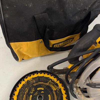 Electric Dewalt circular saw with bag
