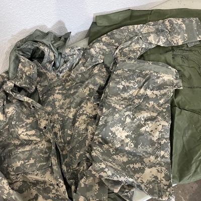 Military issued rain suit and waterproof clothing bag