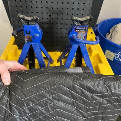 Two moving blankets, 2 1/4 ton jackstand and black plastic squares
